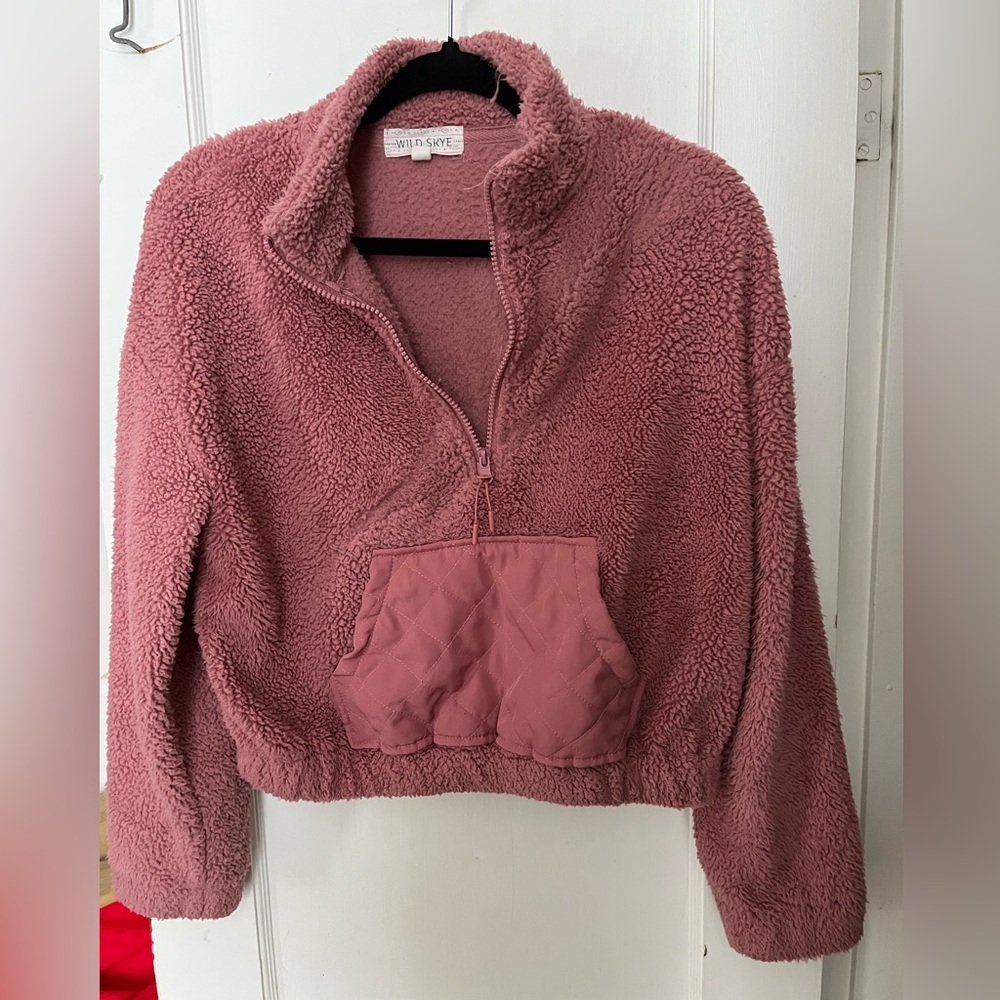 Cozy Sherpa Pink pullover with a front pocket